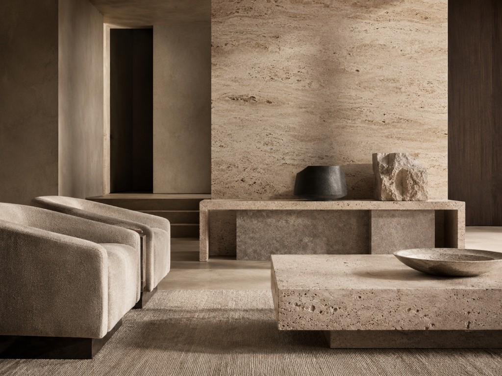 Monolith interior with travertine stone and textured plaster walls